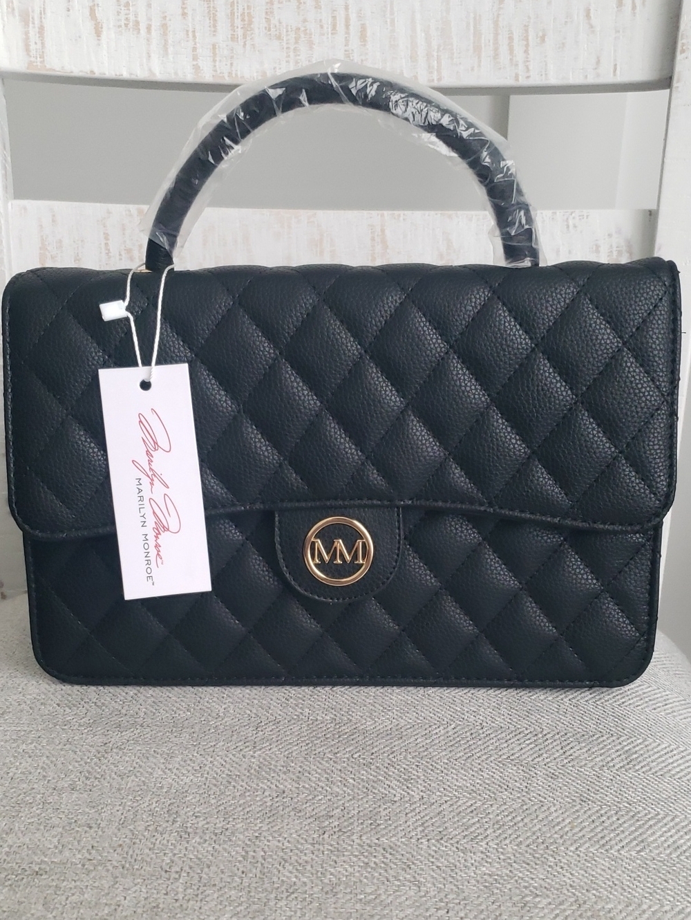 Marilyn Monroe Black Quilted Top-Handle Satchel with Gold MM Emblem